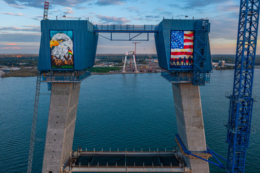 A photograph documenting the early stages of the Gordie Howe International Bridge project between Detroit and Windsor — photograph by Chris Ahern